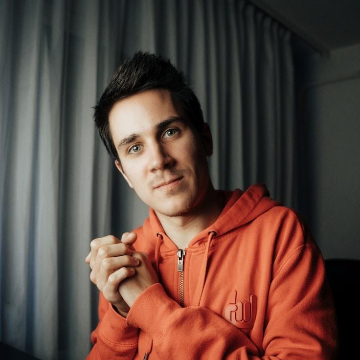 Jordan Li, Client Relations Director, discussing corporate gifting strategy with business clients